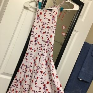 White dress with red roses and purple thorns